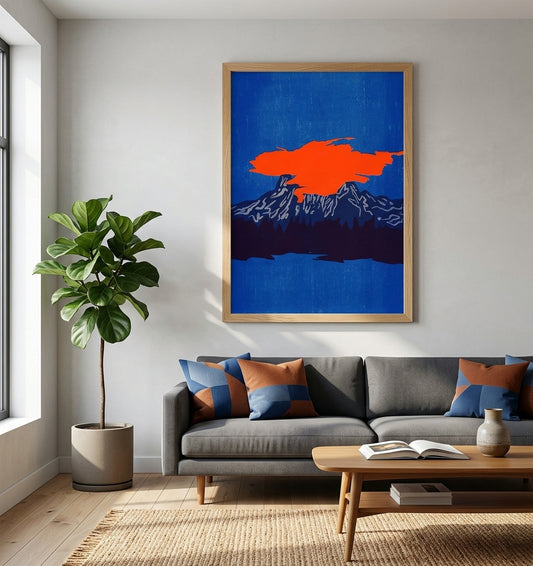 Modern living room with a gray sofa, colorful pillows, a plant, and a framed Abstract Landscape Wall Art Print