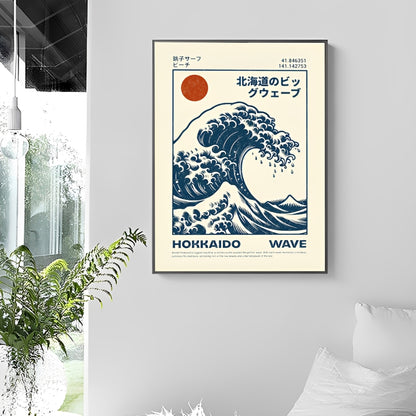 Framed artwork of a Hokusai Wave Poster Print with text on a wall in a room with plants and a window.