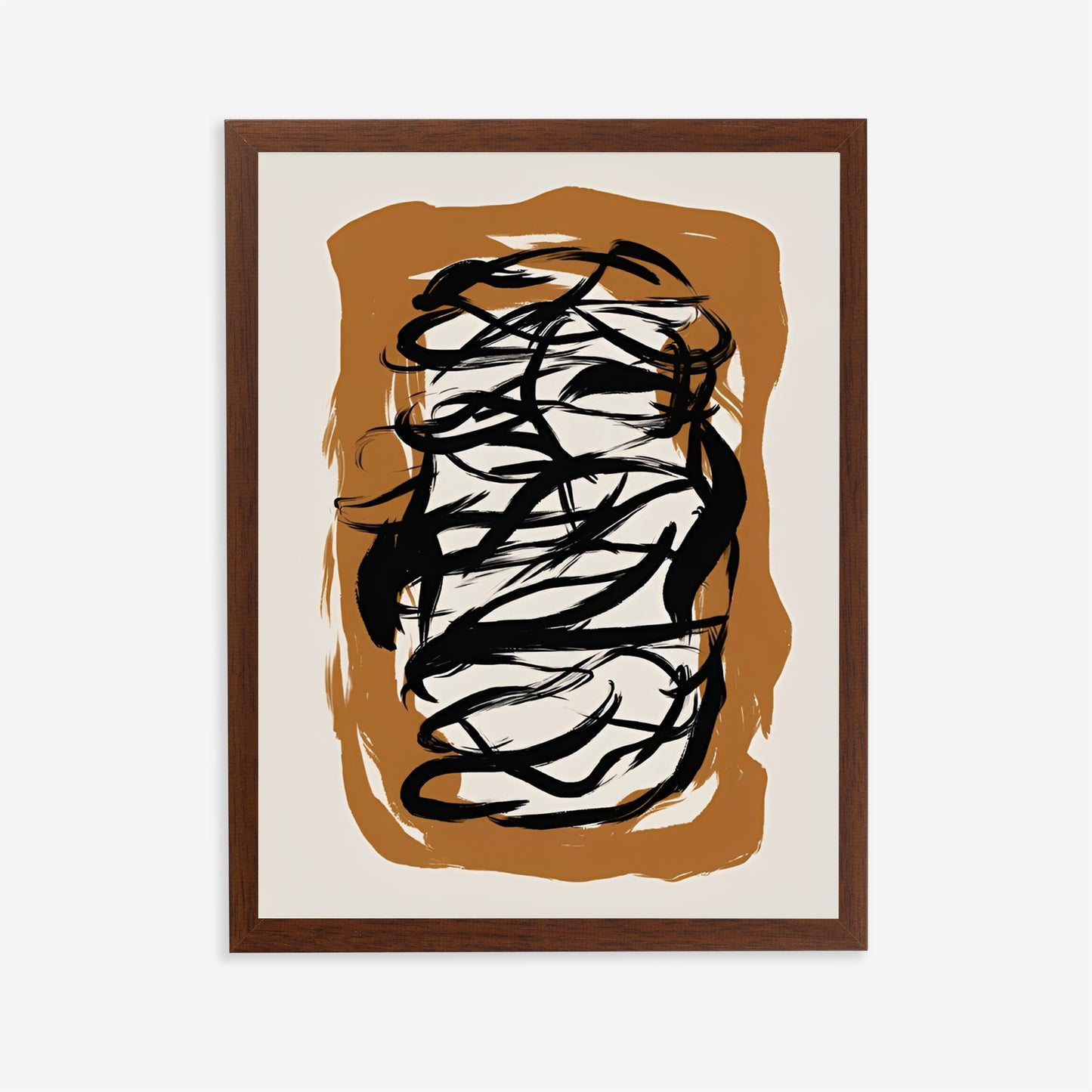 Framed abstract art with black and white design on a brown and beige background