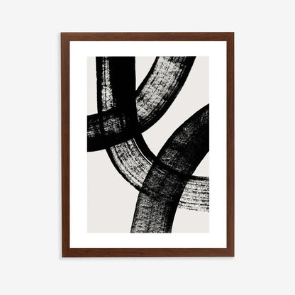 Framed abstract art print with black brush strokes on a white background
