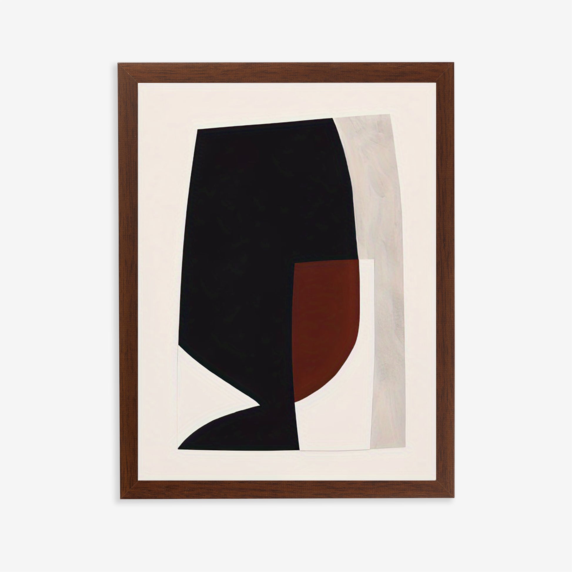 Framed abstract art with black and brown shapes on a white background
