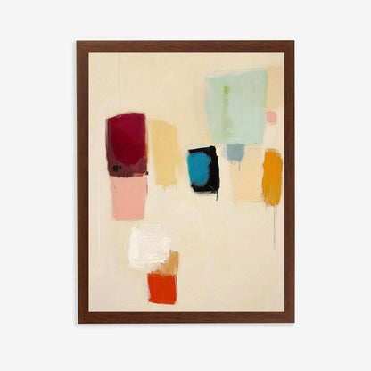 Framed abstract art with colorful geometric shapes on a beige background