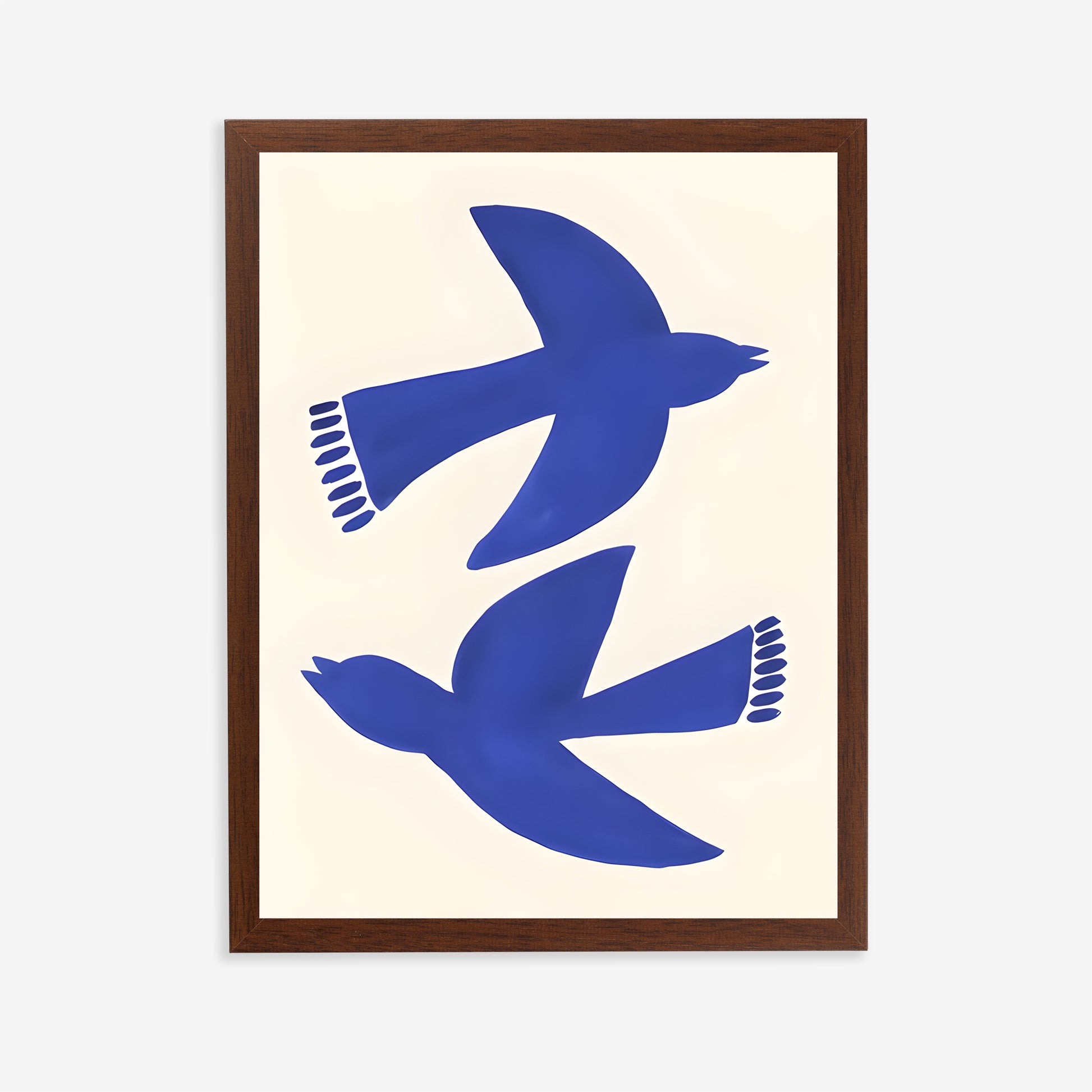 Framed artwork with blue bird silhouettes on a beige background