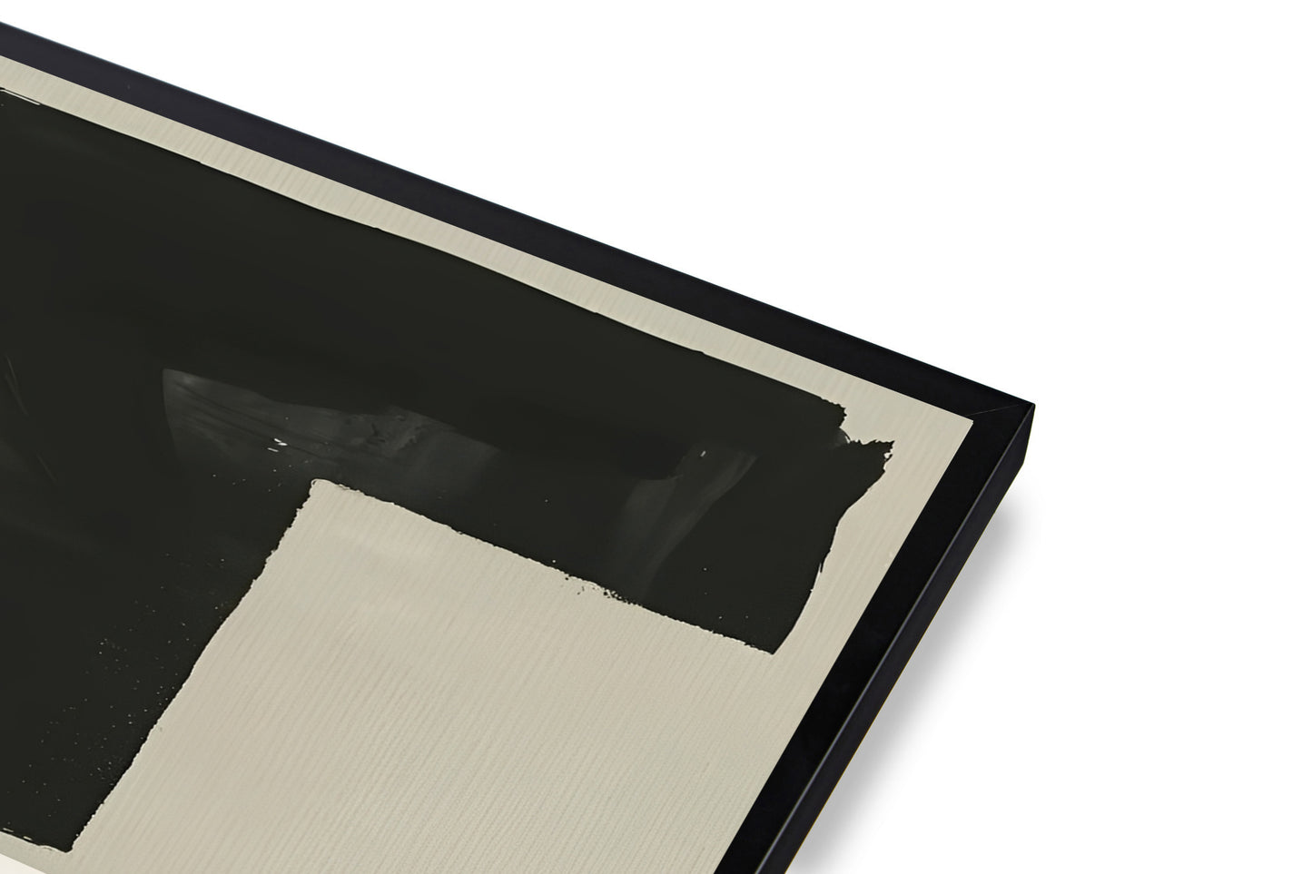 Close-up of a black and beige framed artwork on a white background