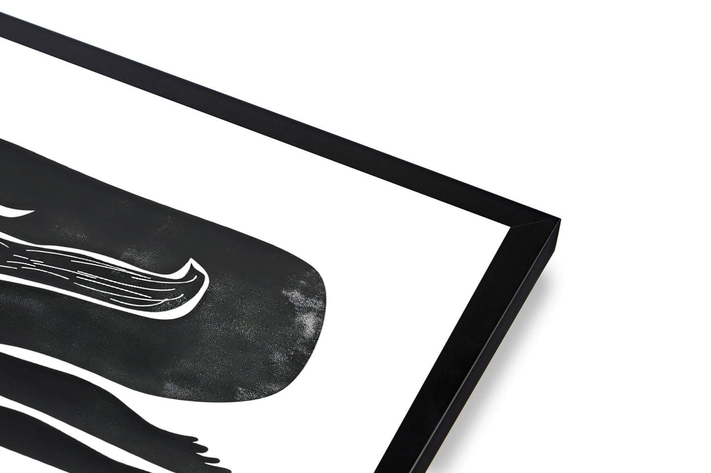 Framed black and white abstract art on a white background