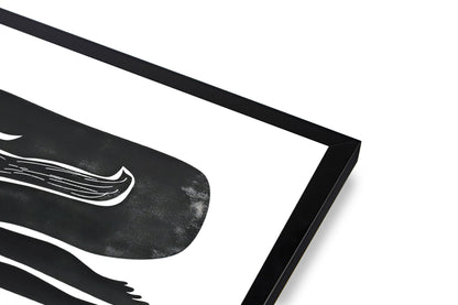 Framed black and white abstract art on a white background