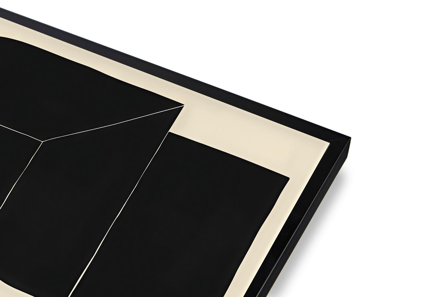 Black and beige geometric patterned tray on a white background