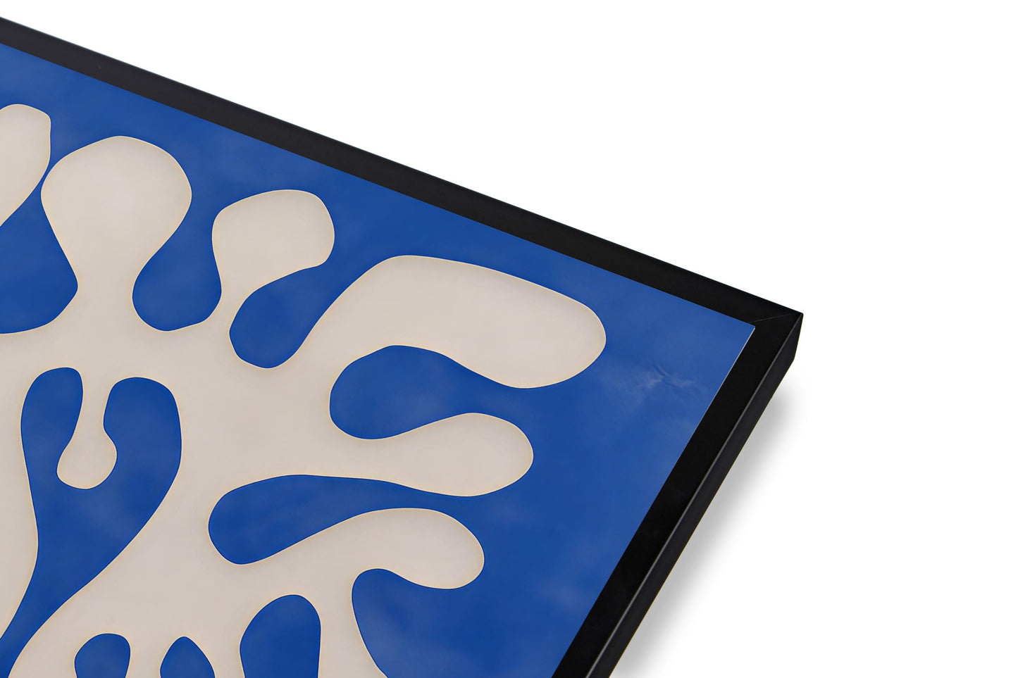 Decorative tray with blue and white abstract design on a white background