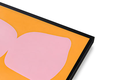 Framed abstract art with pink shape on orange background