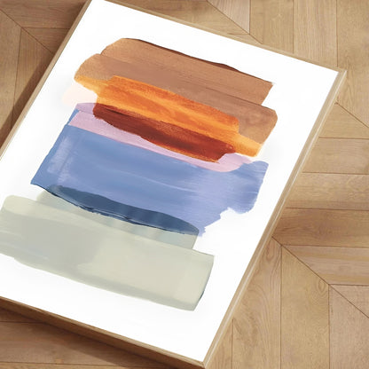 Abstract painting on a white surface with wooden frame