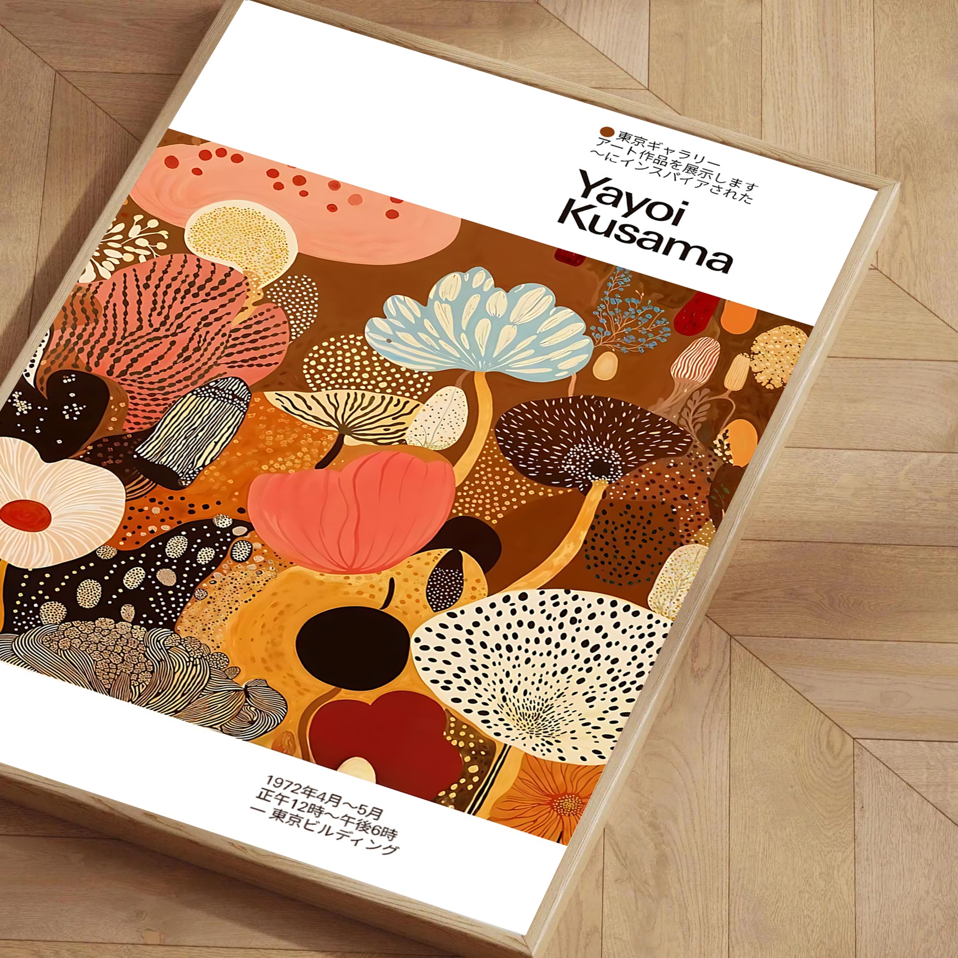 Framed artwork with colorful abstract design and 'Yayoi Kusama' branding on a wooden floor.