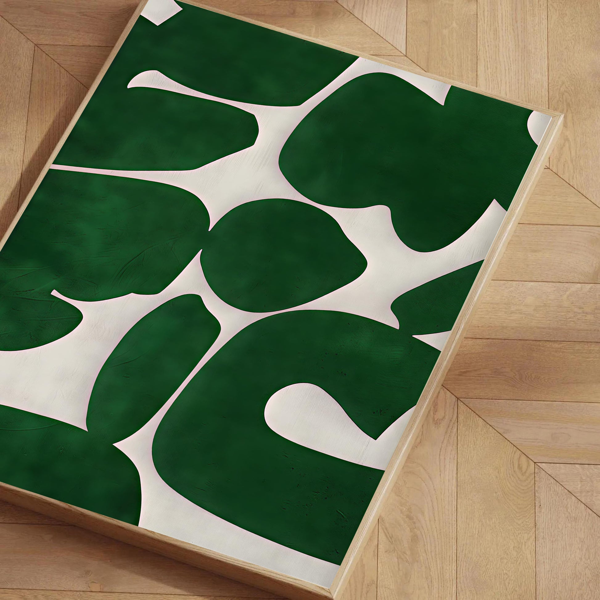 Green and white abstract rug on a wooden floor