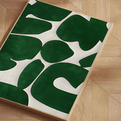 Green and white abstract rug on a wooden floor