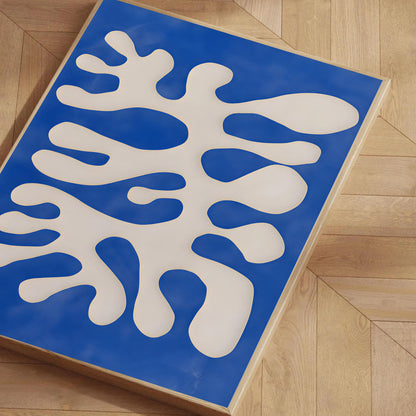 Blue and white abstract design on a wooden floor