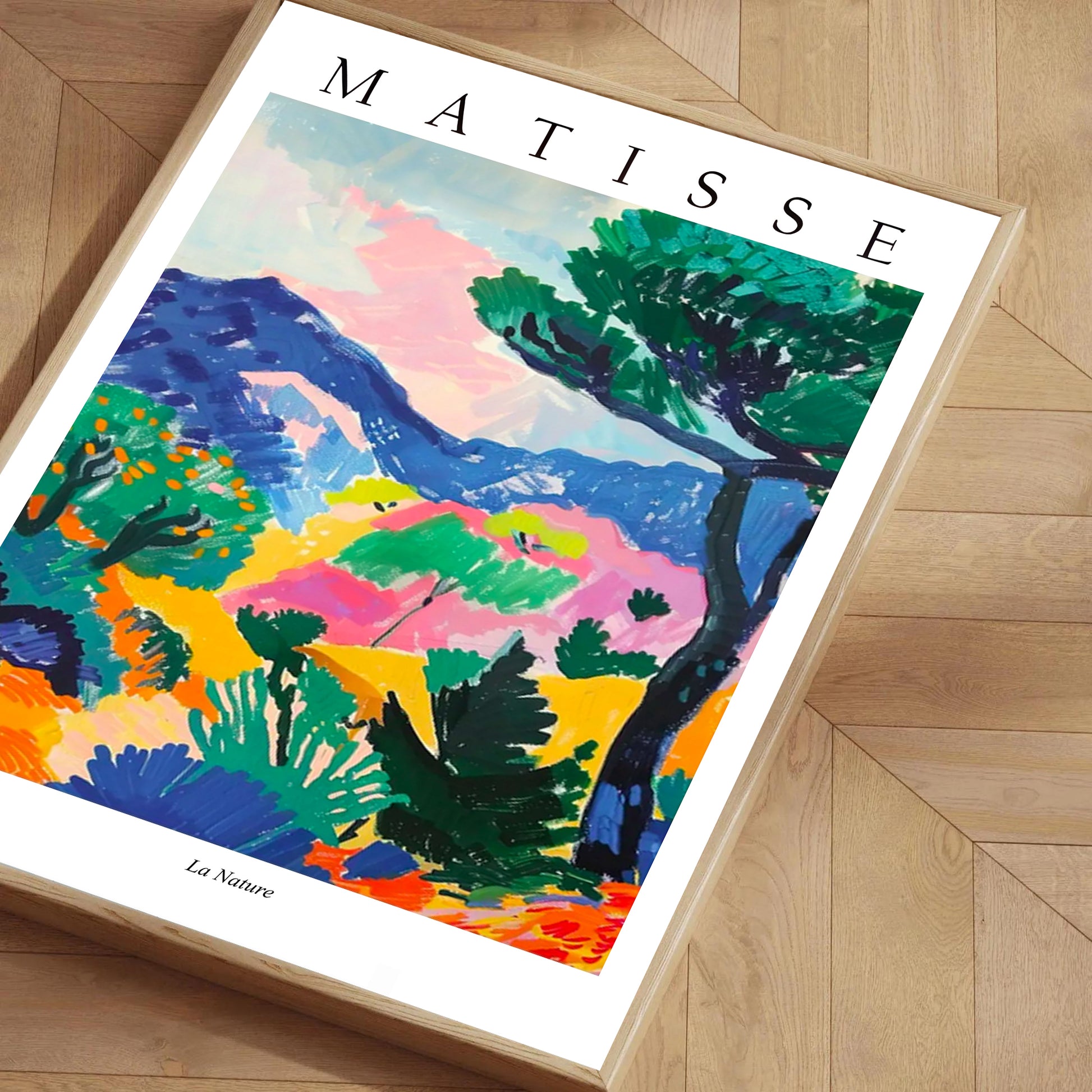 Framed Matisse art print on a wooden floor
