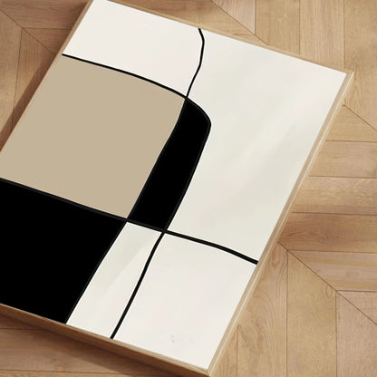 Geometric rug with black, beige, and white pattern on a wooden floor