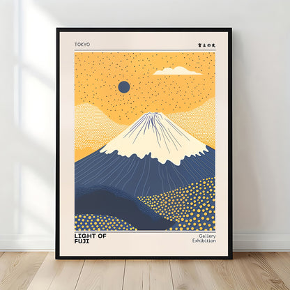Framed artwork of Mount Fuji with a blue sky and orange sun, labeled 'Light of Fuji' on a white wall.
