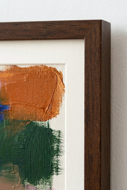 Colorful Modern Abstract Art Print with brown and green strokes in a wooden frame.