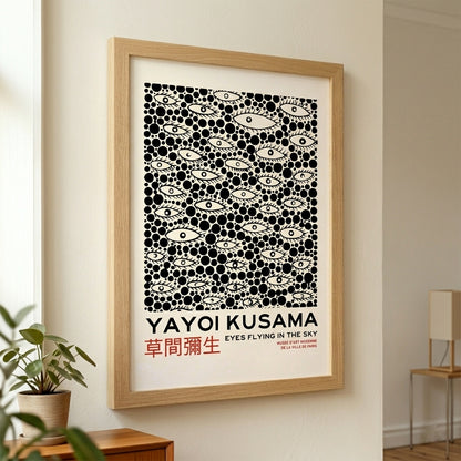 Frmed Yayoi-Kusama Inspired Poster Dots and Eyeson a wall.