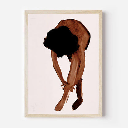 Framed artwork of a person in a yoga pose on a light background