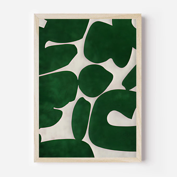 Framed artwork with green leaf pattern on a white background