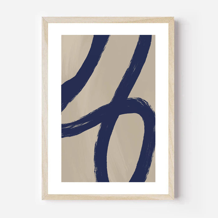 Framed abstract art print with blue brush strokes on beige background