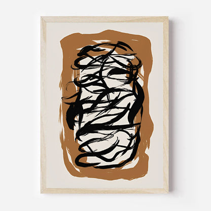 Abstract art print with black brush strokes on a brown and beige background, framed in a light wood color.