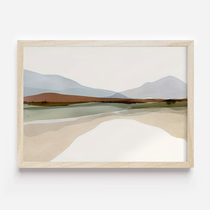 Framed abstract landscape art on a white wall