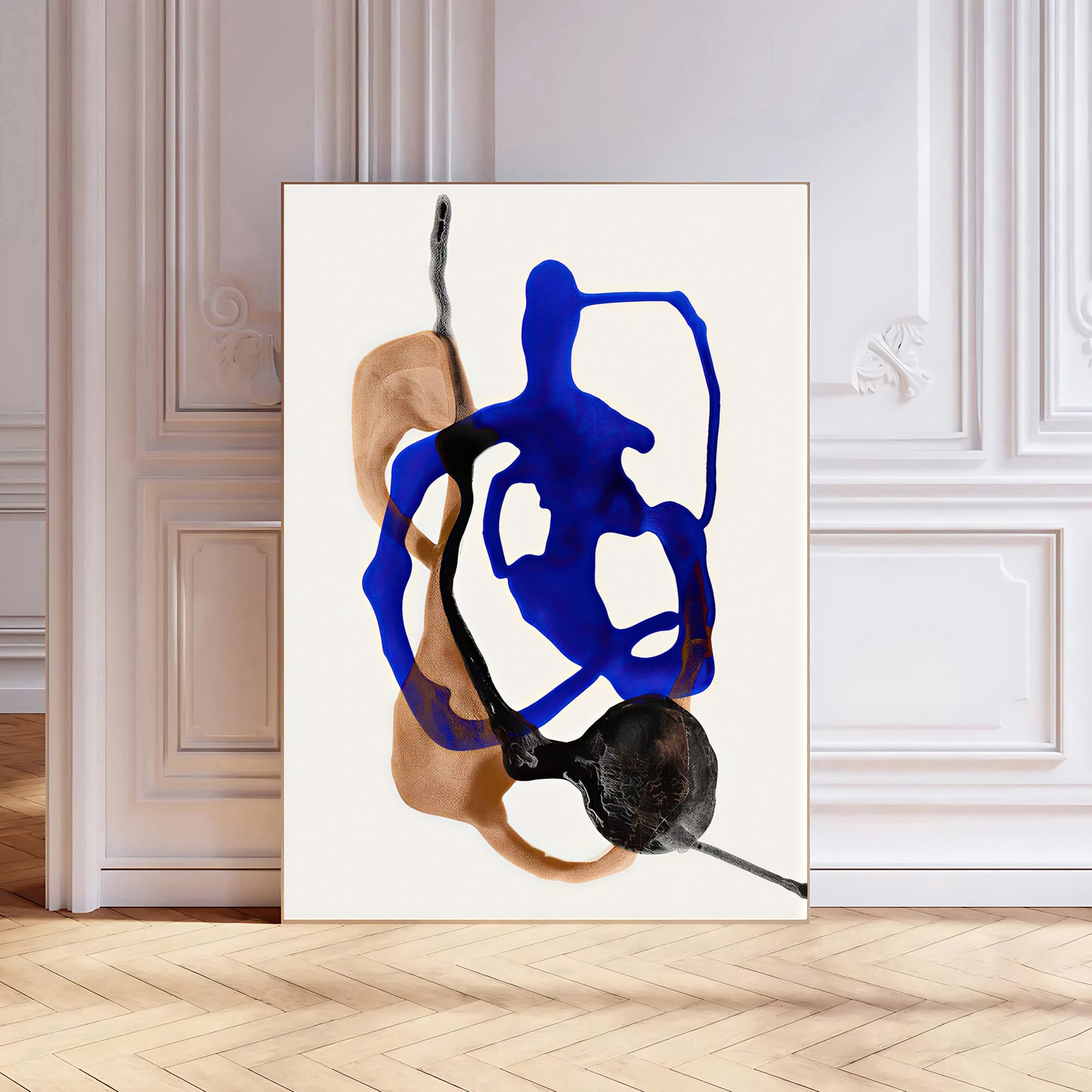 Abstract artwork with blue and brown shapes on a white background, displayed in a room with wooden flooring and white walls.