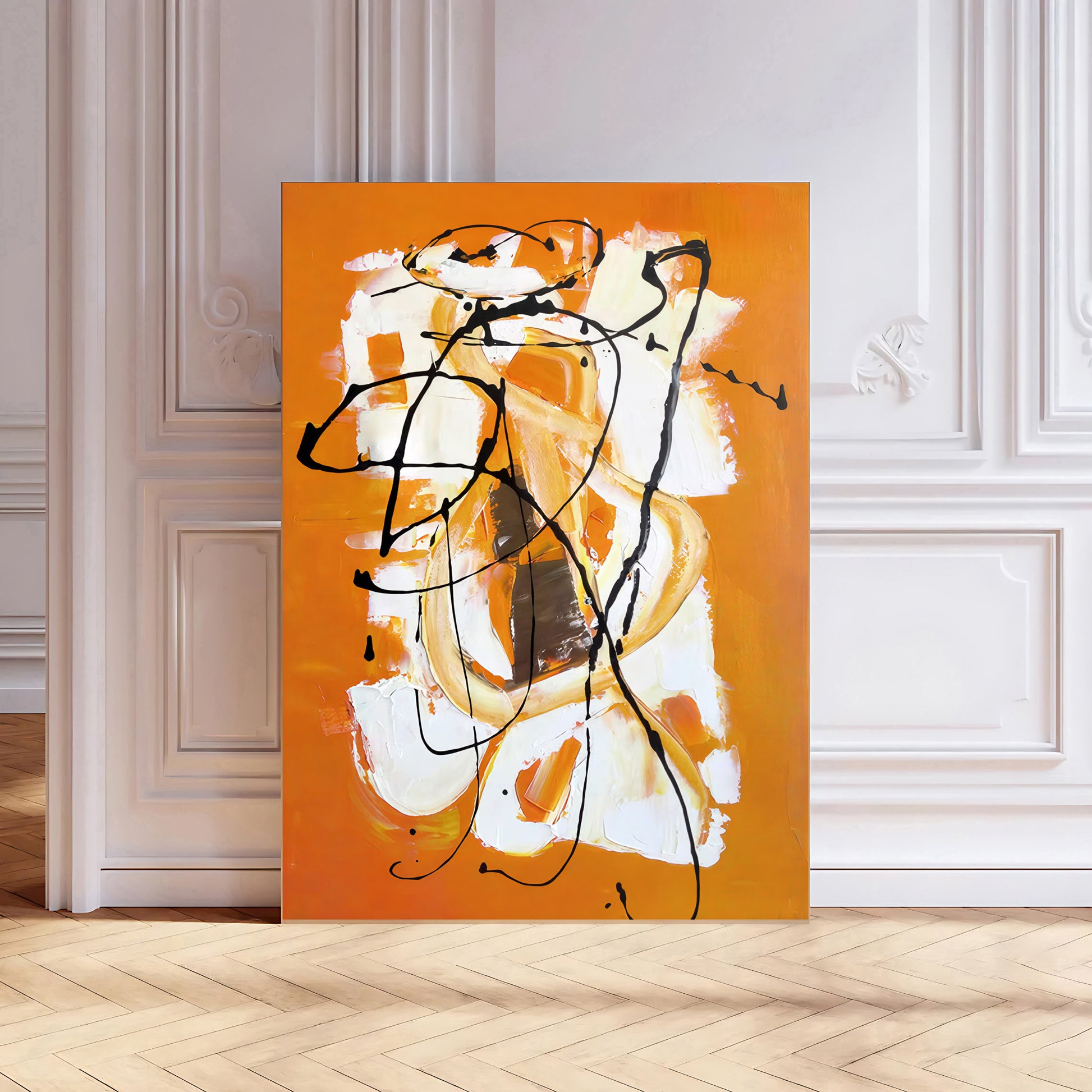 Abstract painting with black and white lines on an orange background in a room with white walls and wooden floor.