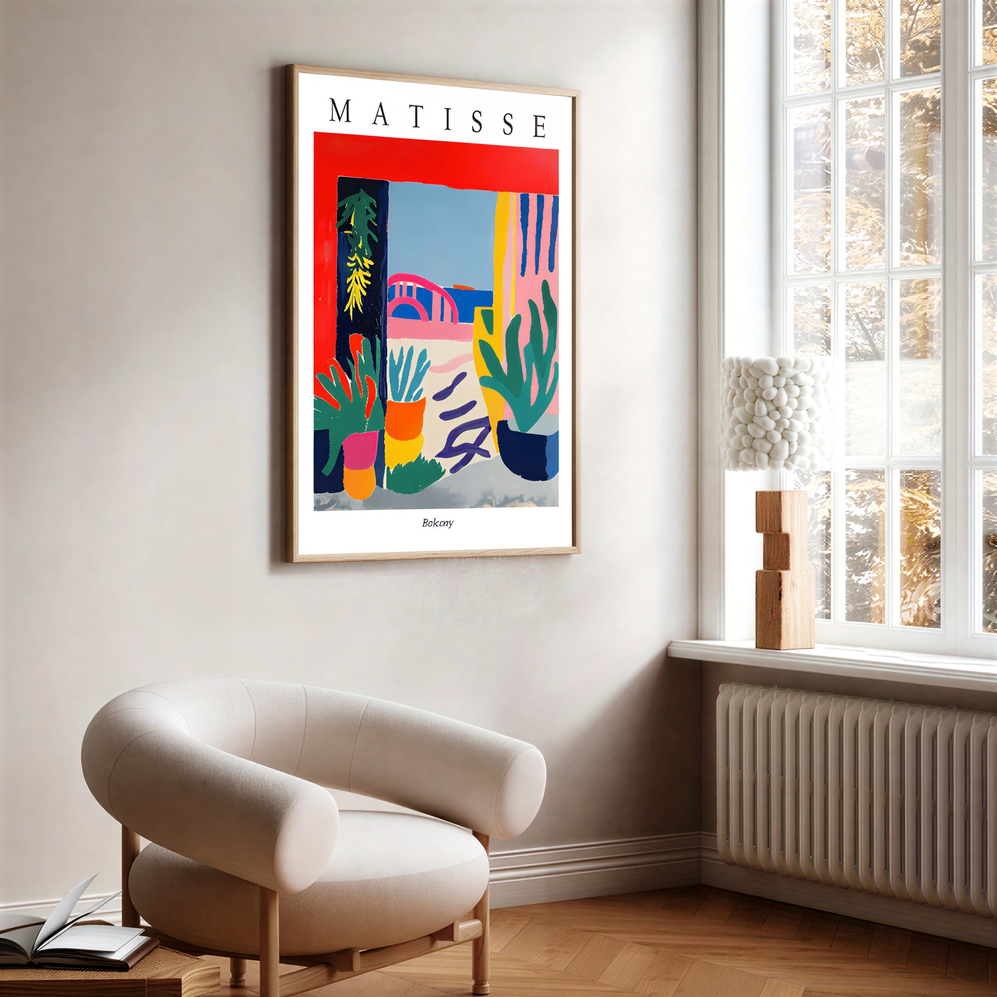 Framed Matisse artwork in a modern living room with a chair and window.