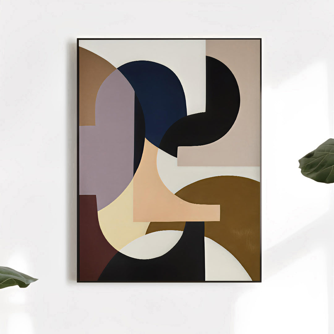 Abstract art print with geometric shapes on a white wall