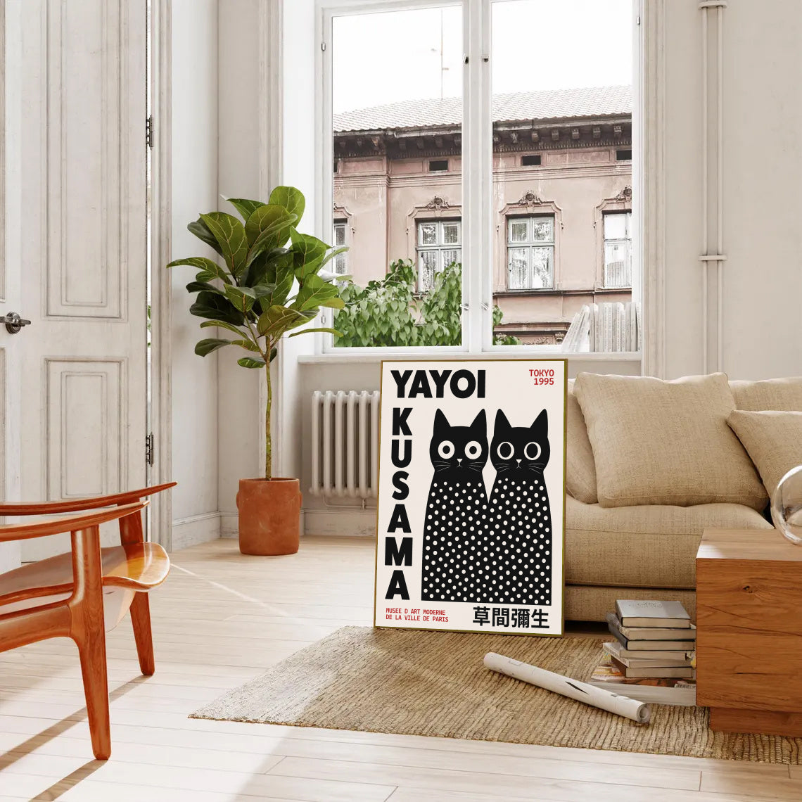 Living room with a Yayoi Kusama Inspired Black Cat Poster, beige sofa, and wooden furniture.