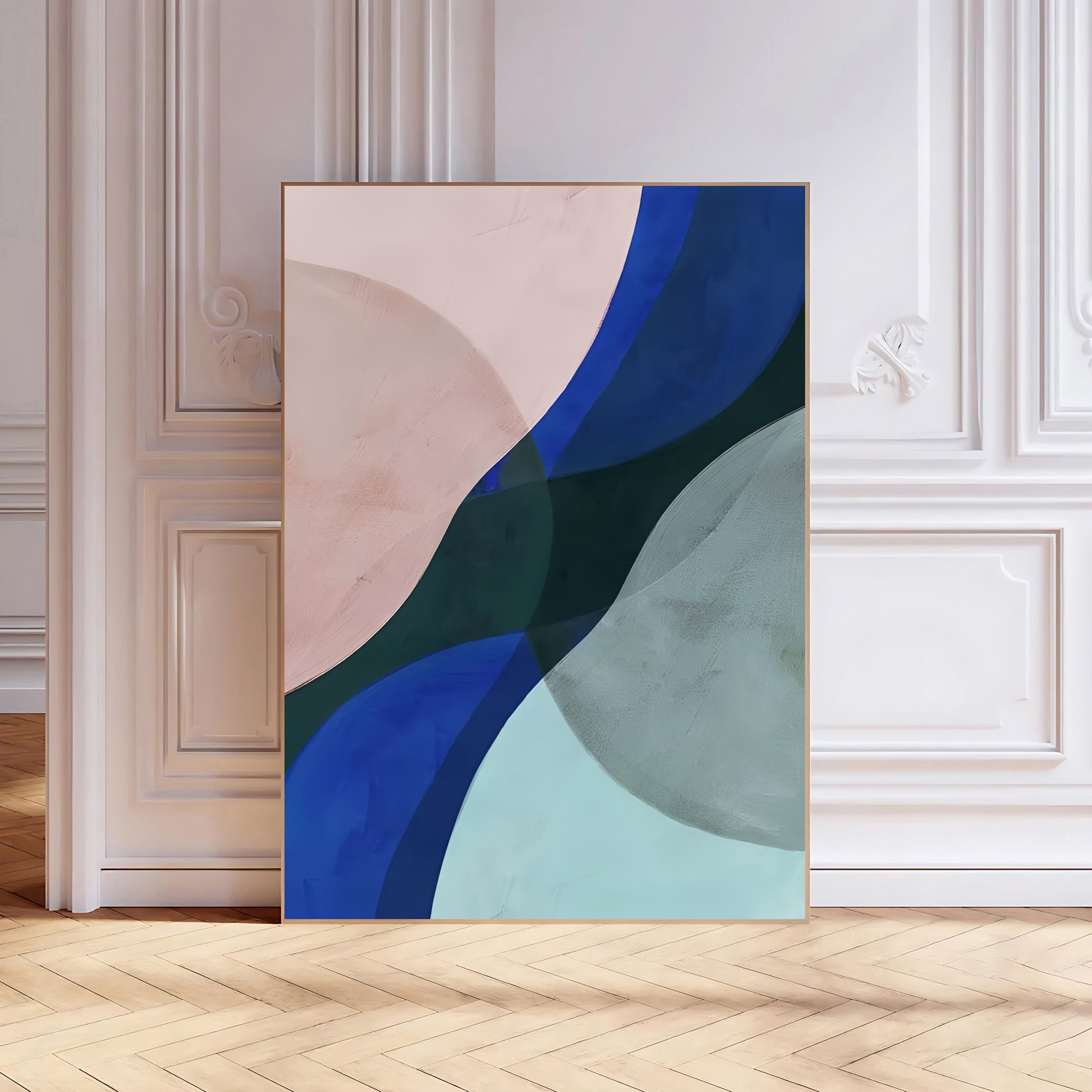 Abstract art piece with blue and green colors on a white wall.