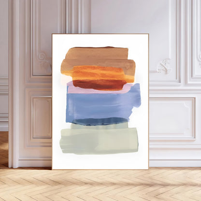 Abstract art print with colorful brush strokes on a white wall.