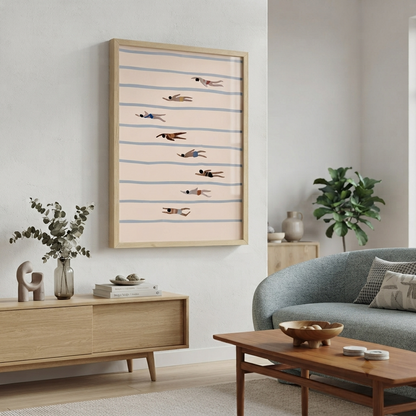 A framed   Minimalist Swimming Pool Art Print with geometric swimmer illustration and Scandinavian design featuring a minimalist design of swimmers on horizontal blue stripes against a pale pink background, styled in a modern living room setting.