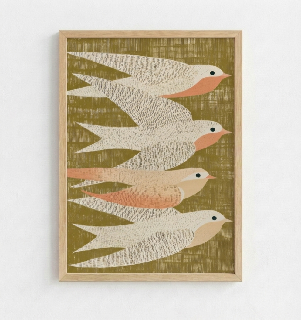 Framed wall art featuring four stylized birds in cream, beige, and peach tones on an olive green textured background, shown hanging on a white wall.