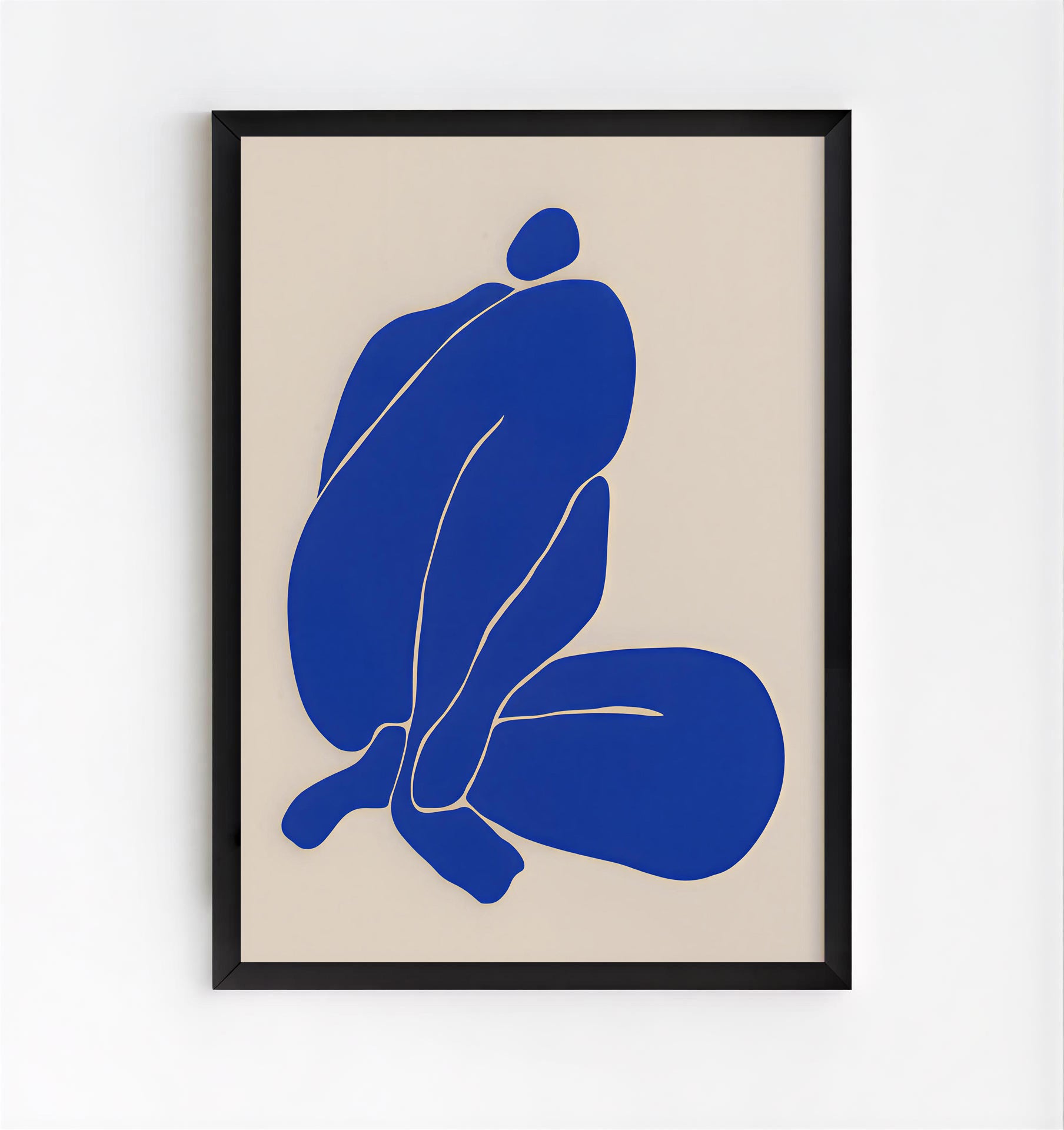 Framed abstract art print with a blue silhouette on beige background