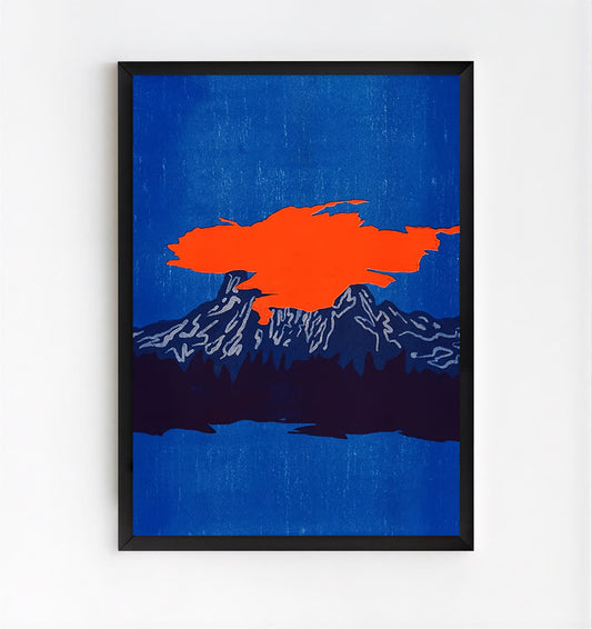 Framed artwork with a blue background and orange abstract shape