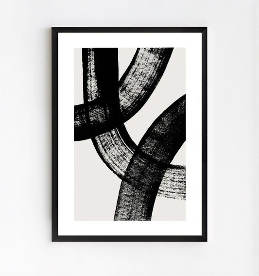 Framed abstract art print with black and white brushstroke design on a light gray background