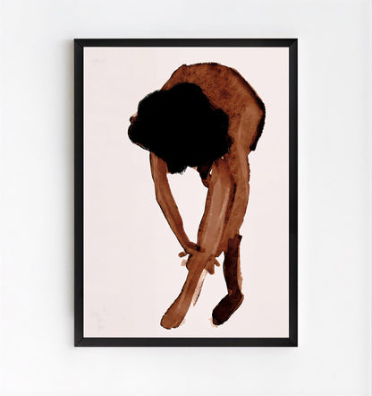 Framed artwork of a person in a crouched position on a light pink background