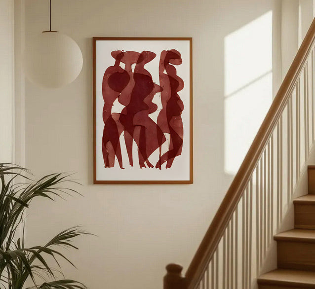 Abstract red art print on a wall above a staircase