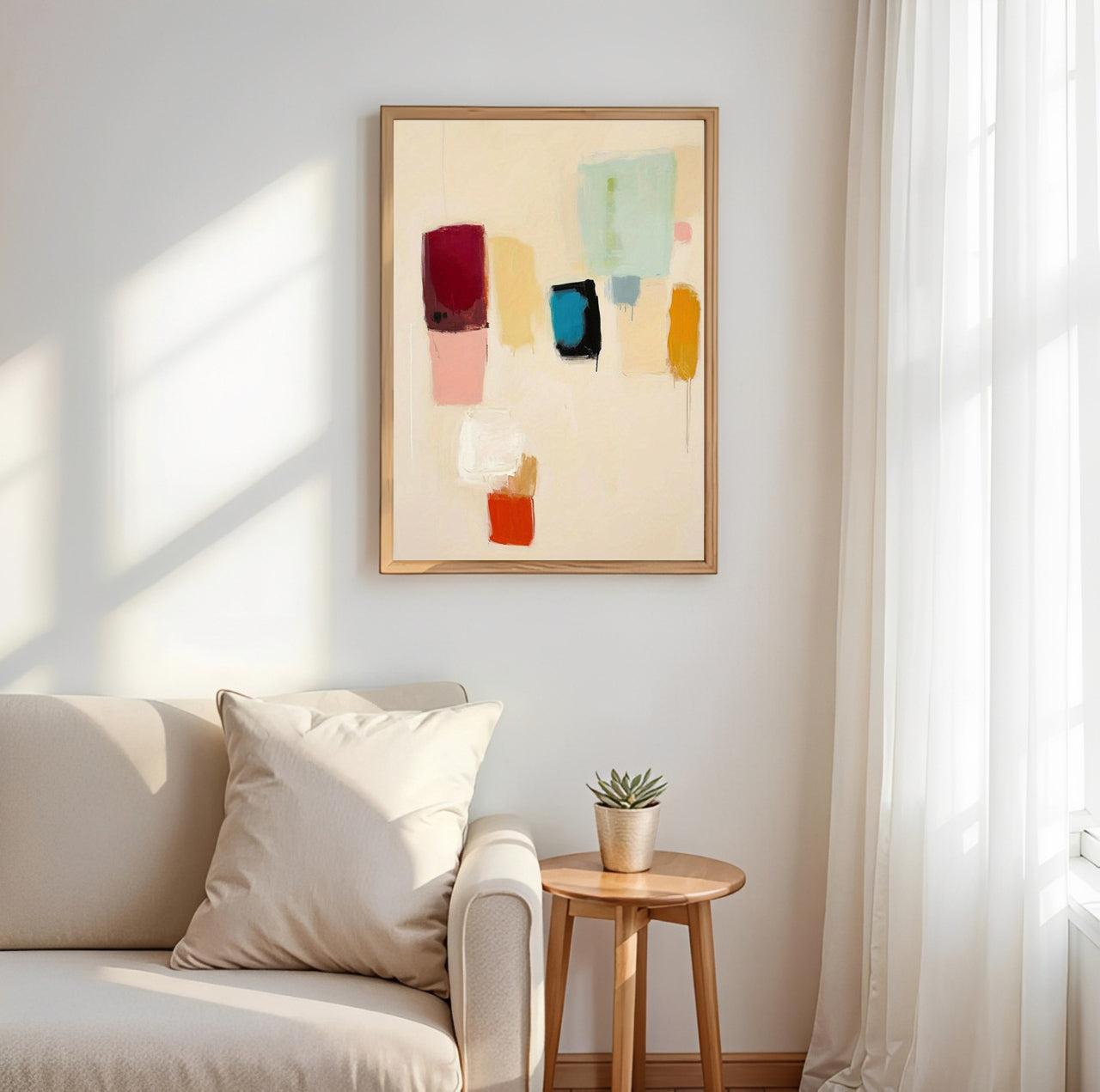 Living room with a beige sofa, small wooden table, and abstract art on the wall.