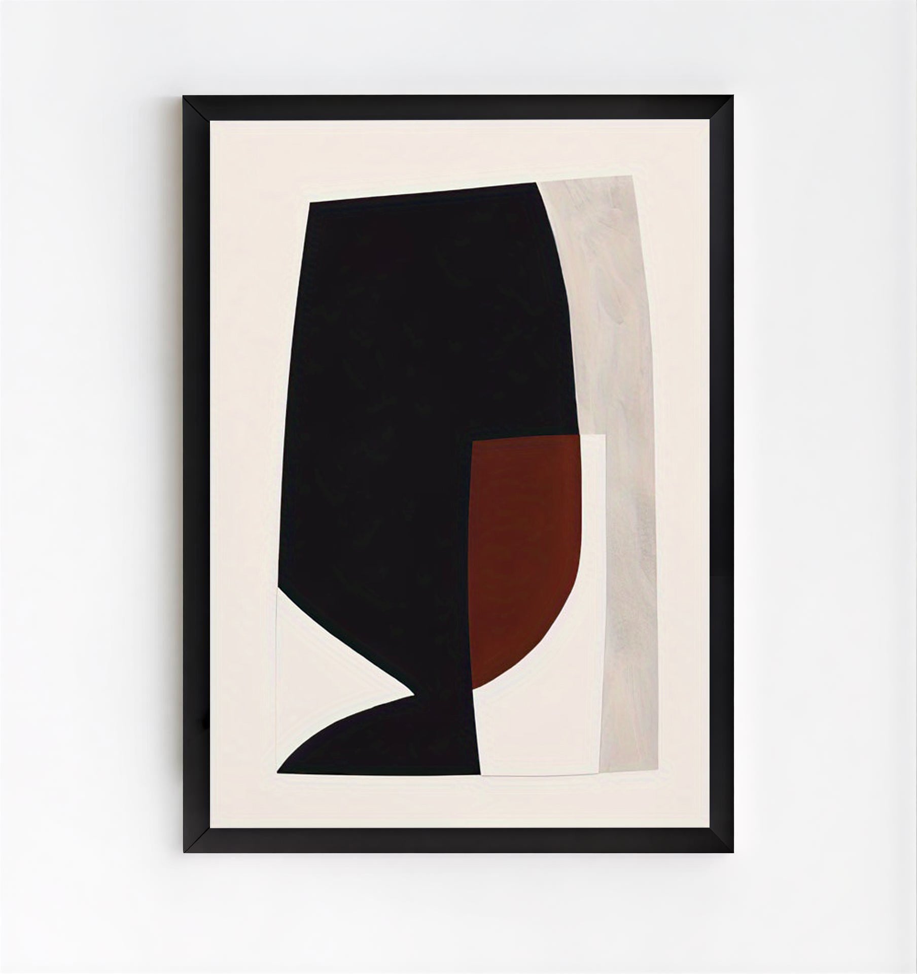 Framed abstract art print with black and brown shapes on a beige background