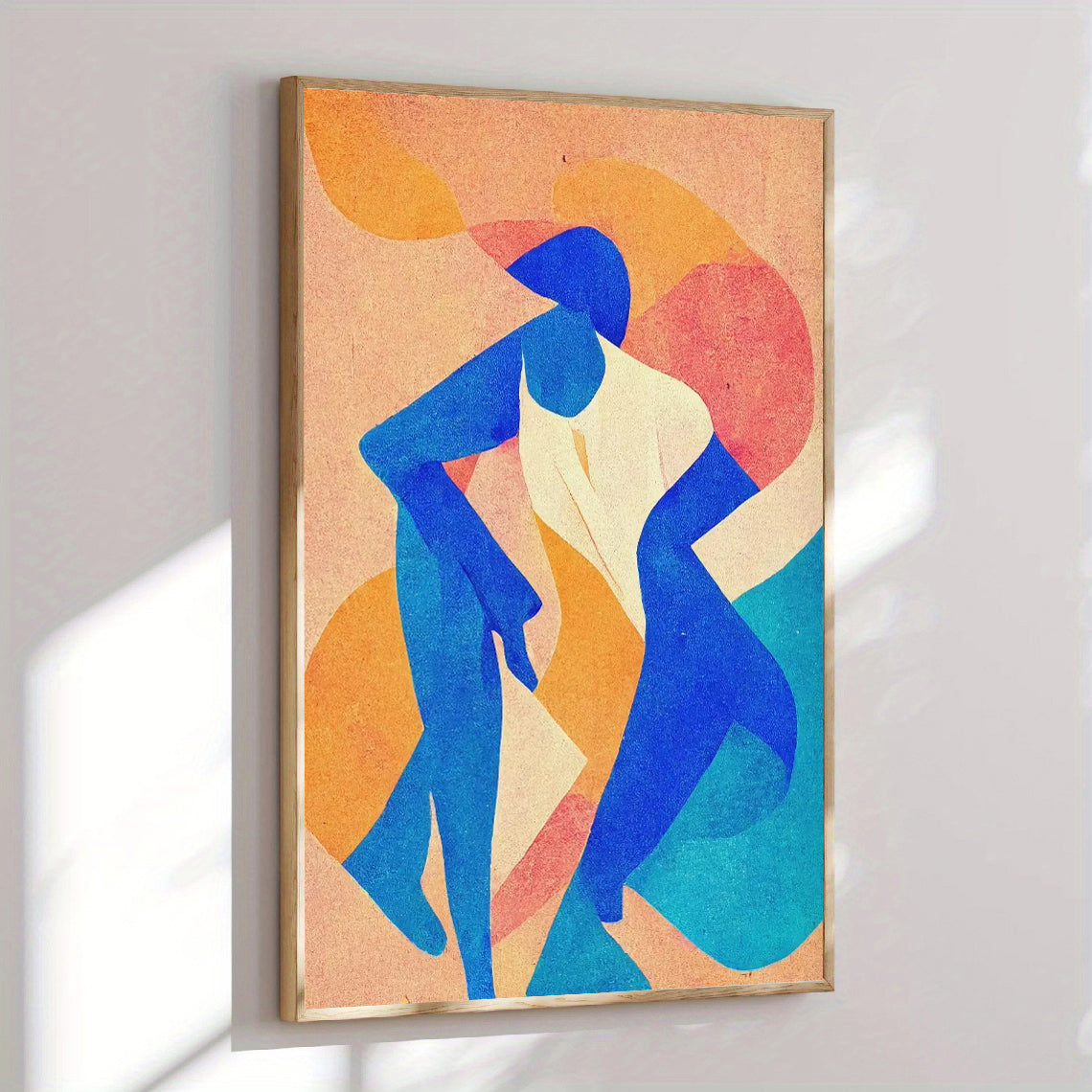 Abstract art print with blue figures on a colorful background, framed in a gold border.