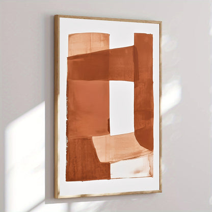 Abstract art print with brown shapes in a gold frame on a white wall