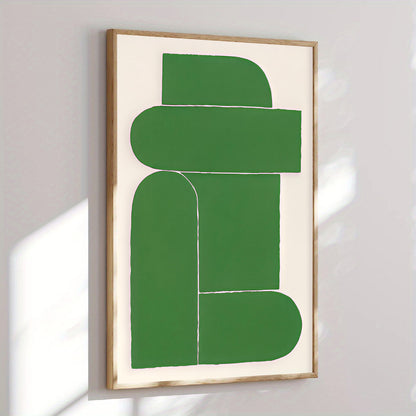 Abstract green art piece on a white wall with a wooden frame.