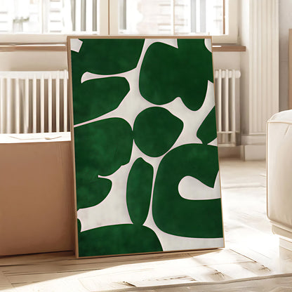Decorative green and white patterned fabric on a wooden surface with a neutral background