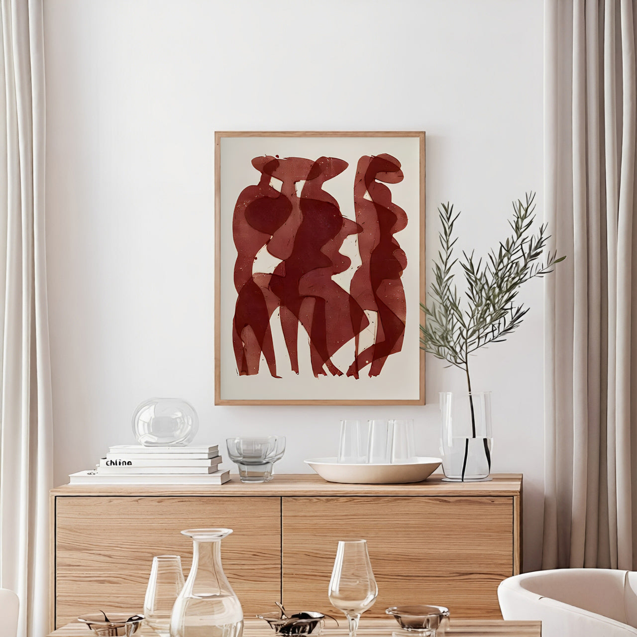 Dining room with wooden cabinet, abstract art, and decorative items.