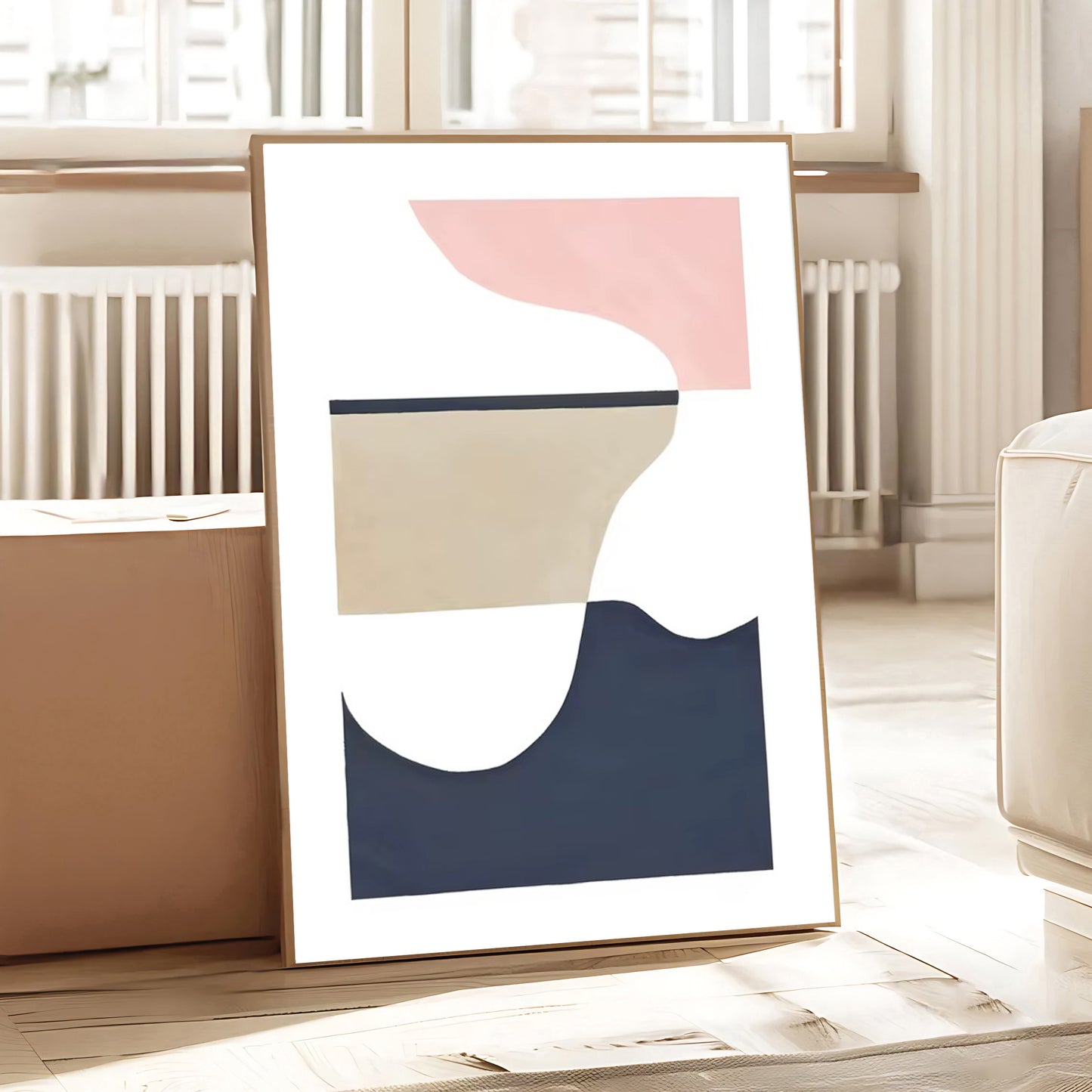 Abstract art print with geometric shapes in a minimalistic room.